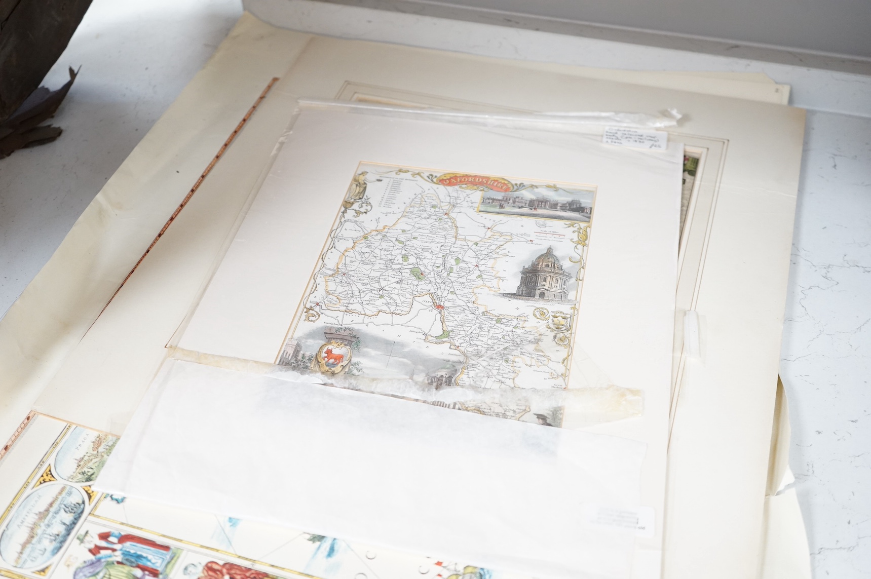 A collection of 18th century and later engraved and printed maps to include Oxfordshire, Cumberland, Berkshire and two unframed 1976 Saxtons maps, largest 50 x 60cm